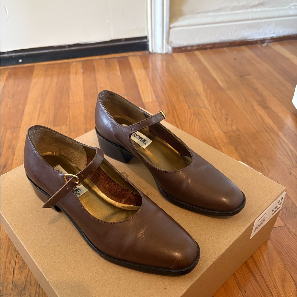 Brown heeled loafer shoes
